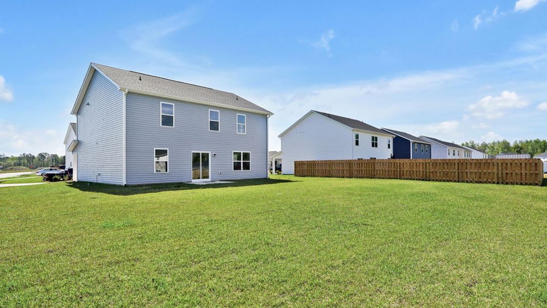 Exterior details and patio area of a home in Driftwood, Richlands (Image 25).