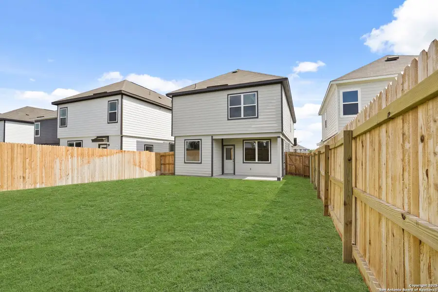 Exterior details and patio area of a home in Melissa Ranch, San Antonio (Image 4).
