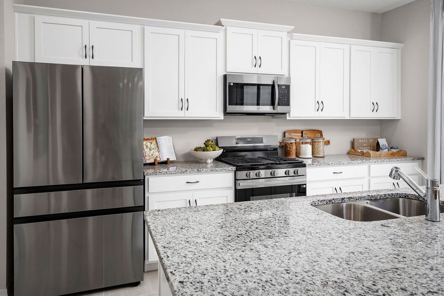 Representative furnished interior of a home built from the Cape by Risewell Homes in Marion Ridge, Haines City (Image 6).