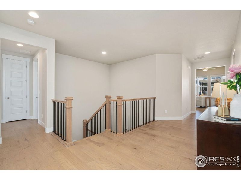 Foyer greets you with engineered hardwood floors!