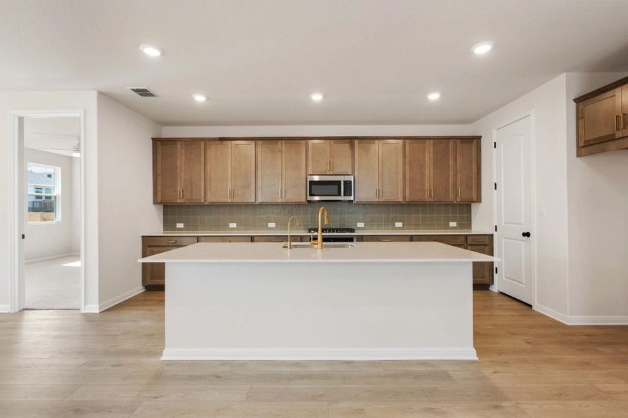 Furnished interior view inside a new home in Cannon Ranch, Dripping Springs (Image 6).