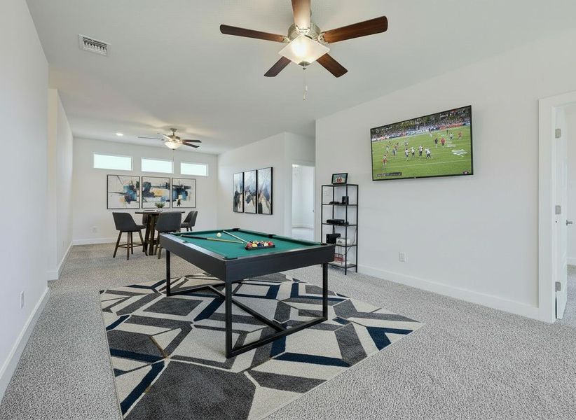 Furnished interior view inside a new home in Rough Hollow, Lakeway (Image 13).