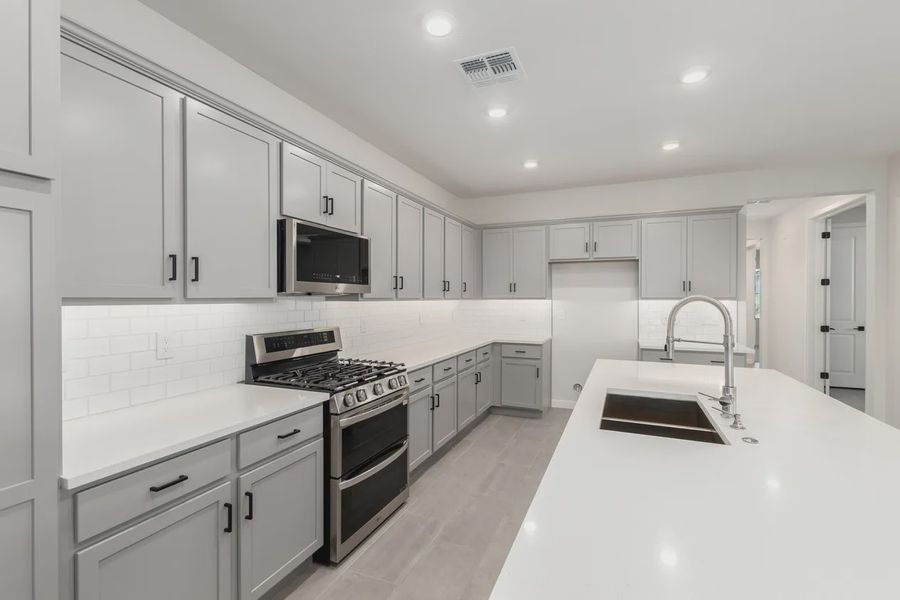 Furnished interior view inside a new home in Avanti at Granite Vista, Waddell (Image 8).