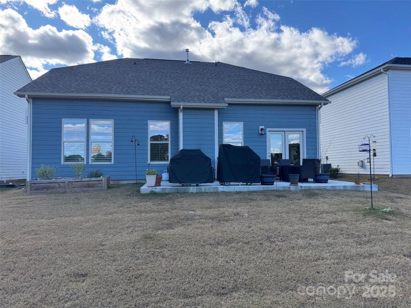 Exterior details and patio area of a home in , Belmont (Image 3). Exterior details and patio area of a home in , Belmont (Image 3).