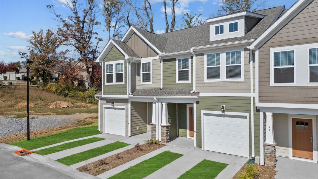 Superior craftsmanship throughout this established townhome community near vibrant Downtown Asheville