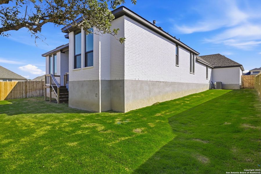 Exterior details and patio area of a home in Ventana - 60', Bulverde (Image 22).