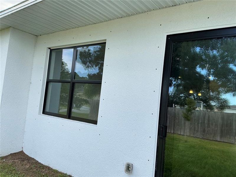 Exterior details and patio area of a home in , Palm Bay (Image 19).