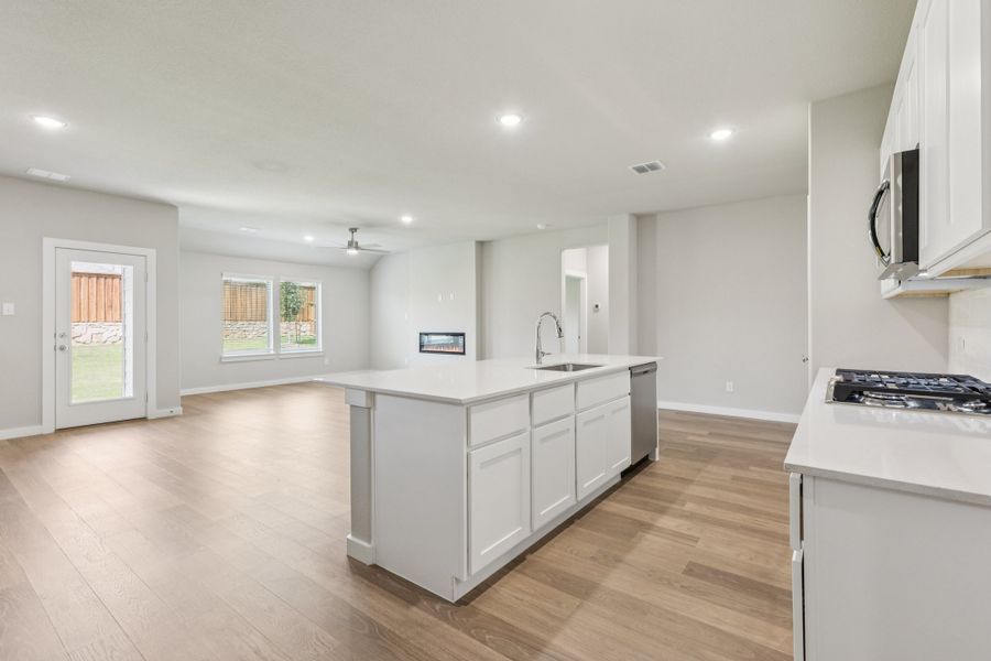 Open Floorplan in the Heisman home plan by Trophy Signature Homes – REPRESENTATIVE PHOTO Open Floorplan in the Heisman home plan by Trophy Signature Homes – REPRESENTATIVE PHOTO