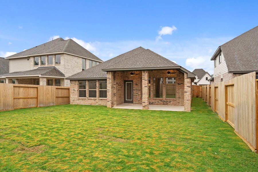 Exterior details and patio area of a home in The Highlands, Porter (Image 4).