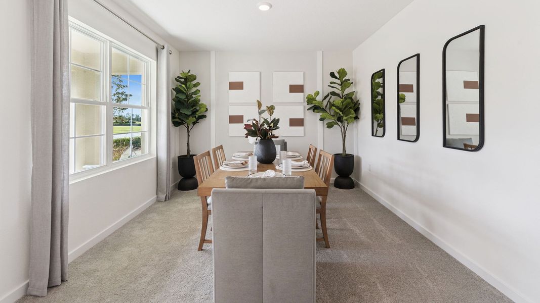 Representative furnished interior of a home built from the HAYDEN by D.R. Horton in Wynwood, Ocoee (Image 6).