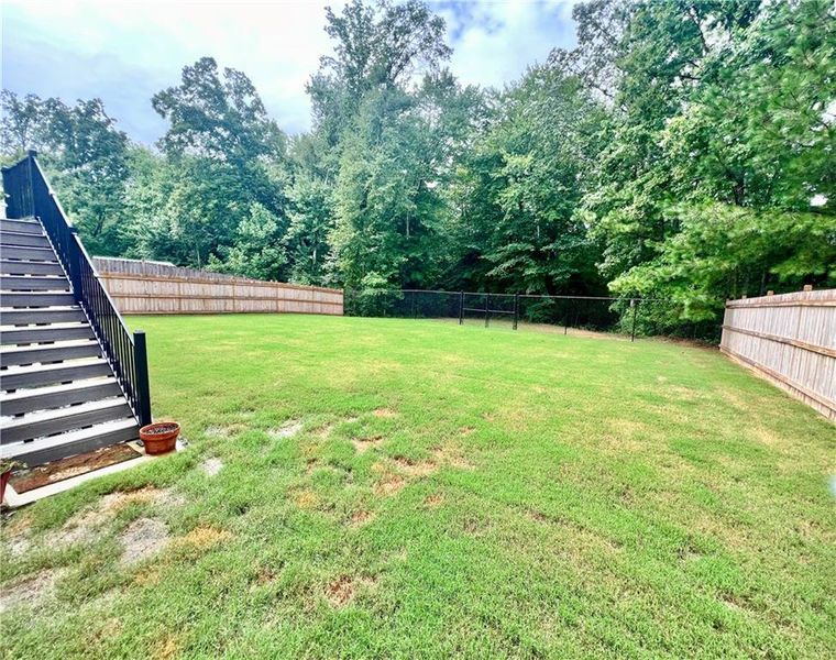 Front exterior of a new home in , Temple, GA, highlighting curb appeal (Image 19). Front exterior of a new home in , Temple, GA, highlighting curb appeal (Image 19).