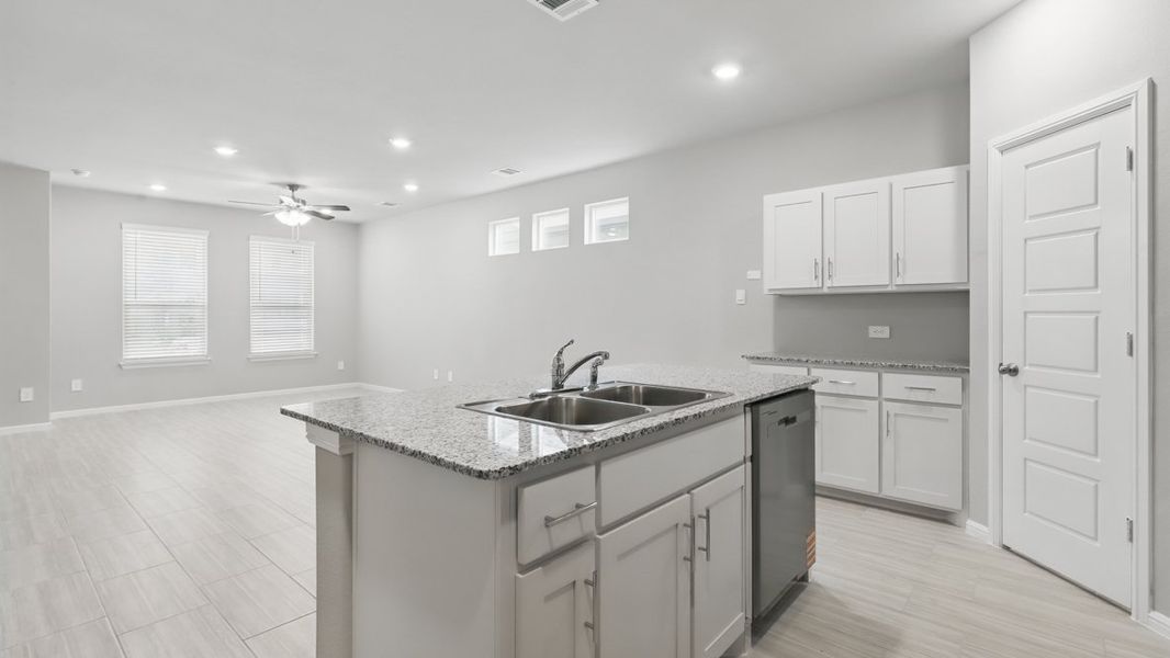 Representative furnished interior of a home built from the HAZELNUT by D.R. Horton in Orchard Village, Fort Worth (Image 9).