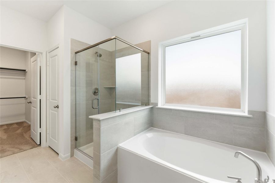 Furnished interior view inside a new home in Sunterra, Katy (Image 13).