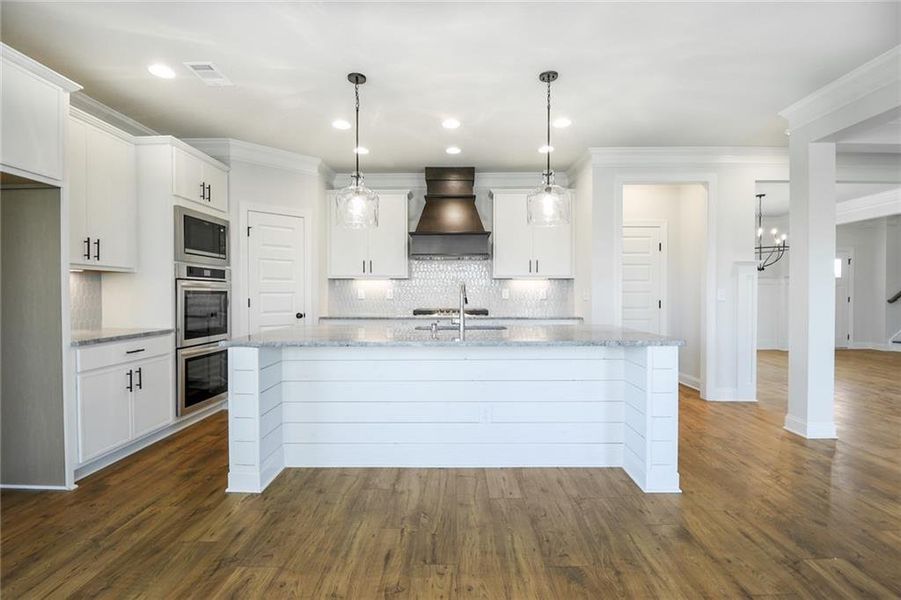 Furnished interior view inside a new home in Calgary Downs, Winder (Image 4).