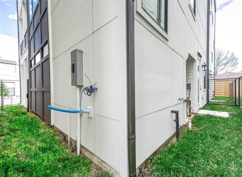 Exterior details and patio area of a home in , Houston (Image 25). Exterior details and patio area of a home in , Houston (Image 25).