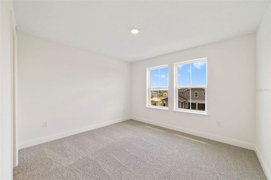 Spacious, unfurnished interior of a new home in Vintner Reserve, Clermont (Image 21).