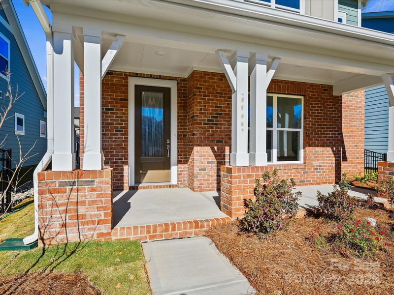 Exterior details and patio area of a home in Whitley Preserve – Park Collection, Mint Hill (Image 3).