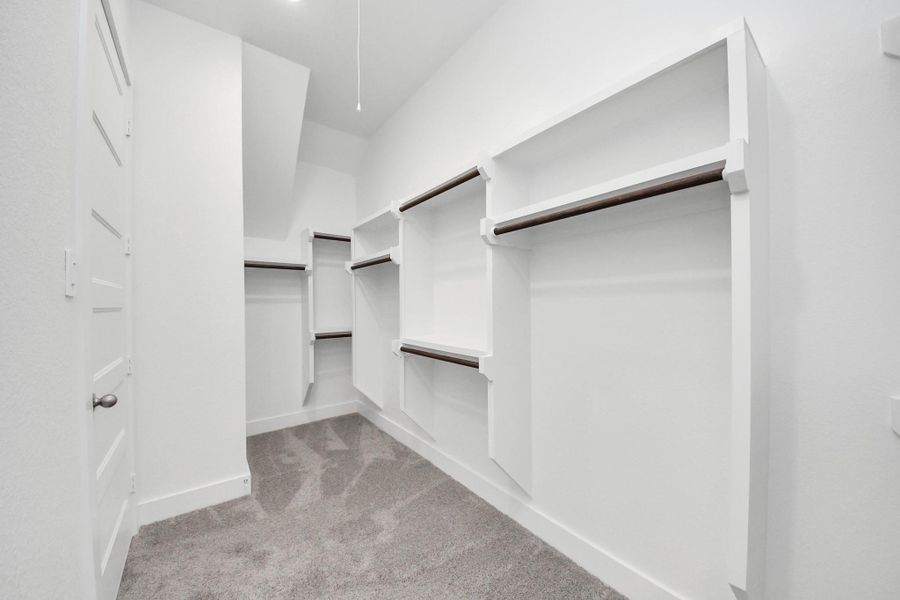 Spacious, unfurnished interior of a new home in Sunterra: Premier Collection, Katy (Image 6).