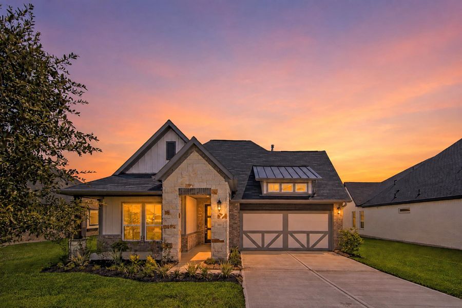 Front exterior of a new home in WaterStone, Montgomery, TX, highlighting curb appeal (Image 21).