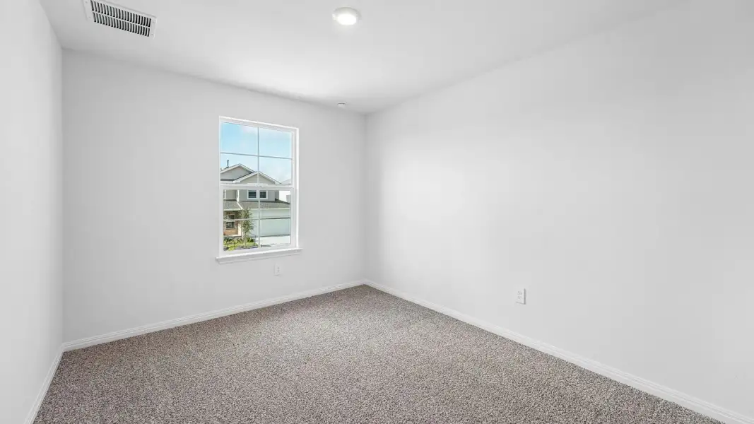 Spacious, unfurnished interior of a new home in Bar W Ranch, Leander (Image 25).