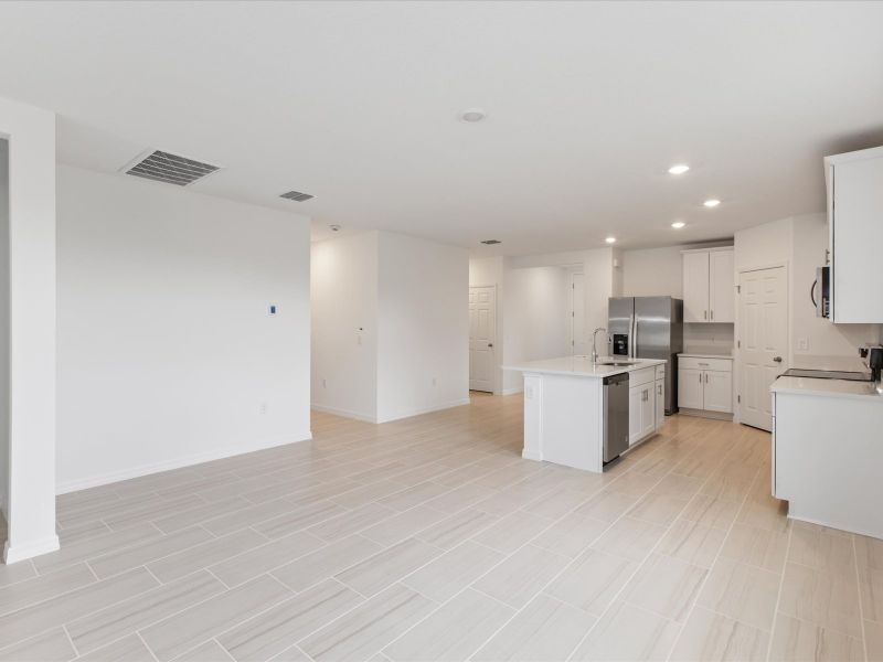 Great room in the Daphne floorplan at 2386 White Tail Street