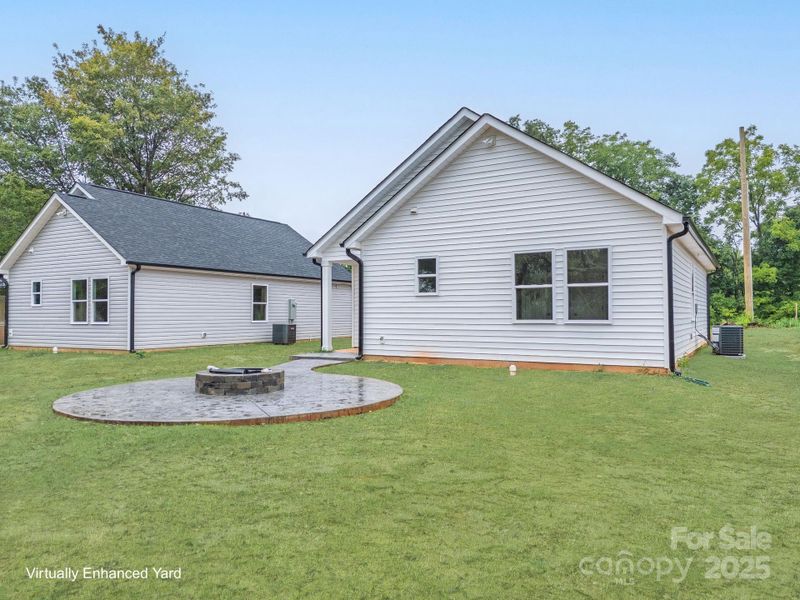 Front exterior of a new home in , East Spencer, NC, highlighting curb appeal (Image 25).