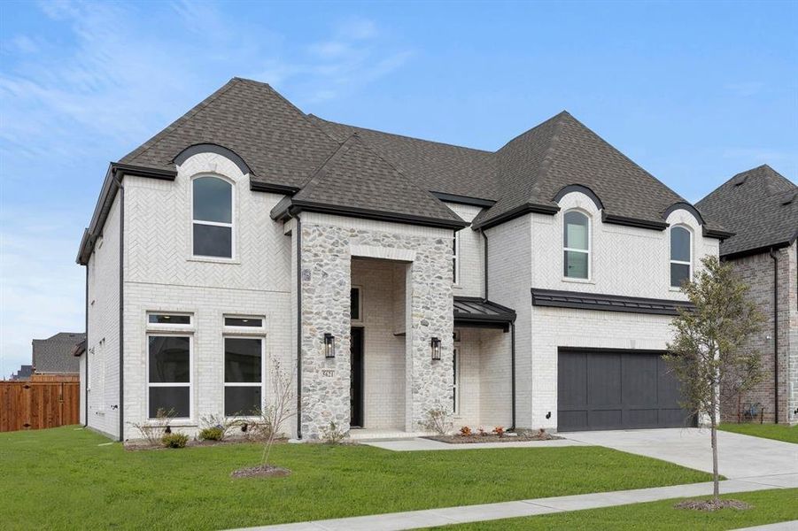 Front exterior of a new home in Sutton Fields, Celina, TX, highlighting curb appeal (Image 2).