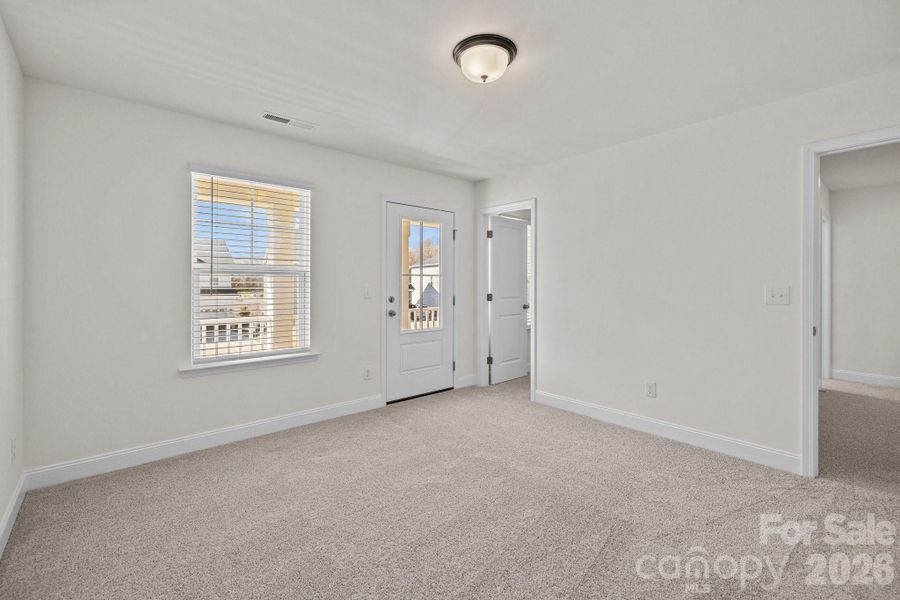 Secondary BedroomPhotos are representative and may not reflect the exact home, finishes, or features.