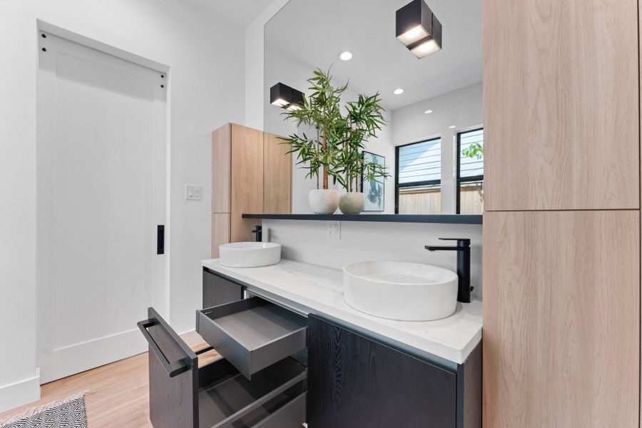 Custom floating vanities with layered lighting and vessel sinks — because beauty belongs in the everyday details. Custom floating vanities with layered lighting and vessel sinks — because beauty belongs in the everyday details.