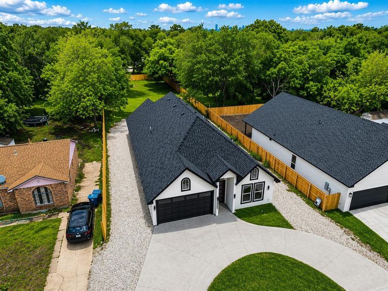 Front exterior of a new home in , Dallas, TX, highlighting curb appeal (Image 26).