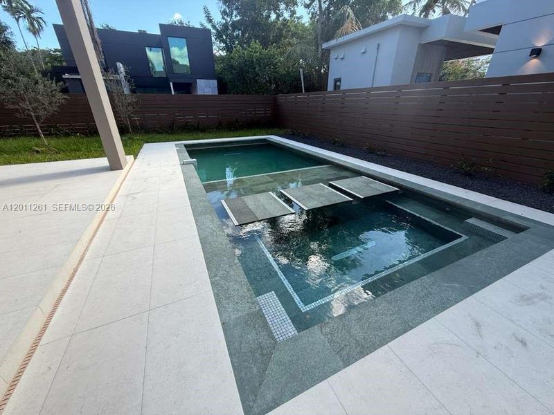 Exterior details and patio area of a home in , Miami (Image 27).