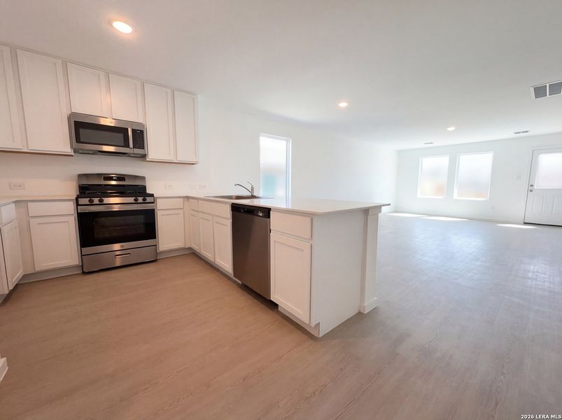 Furnished interior view inside a new home in Hunters Ranch, San Antonio (Image 8).