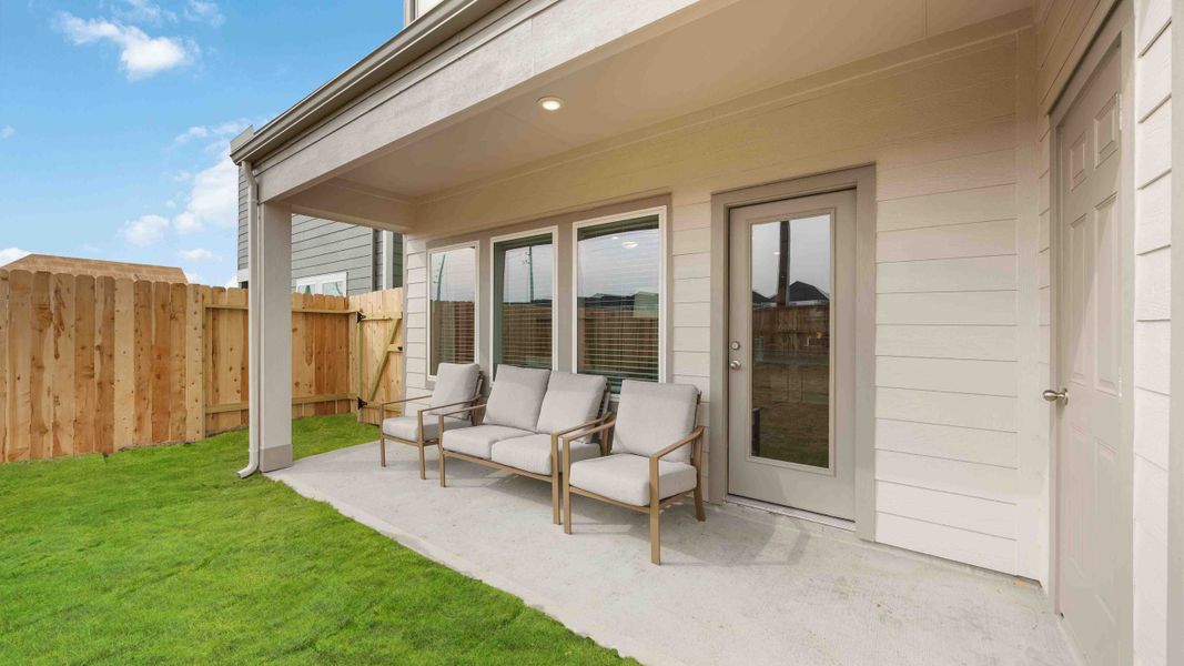 Exterior details and patio area of a home in Grand West, Houston (Image 3).