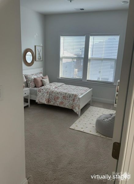 Virtually staged bedroom 3