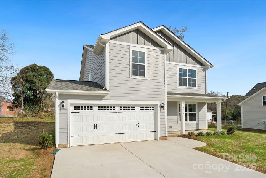 Front exterior of a new home in , Monroe, NC, highlighting curb appeal (Image 2).