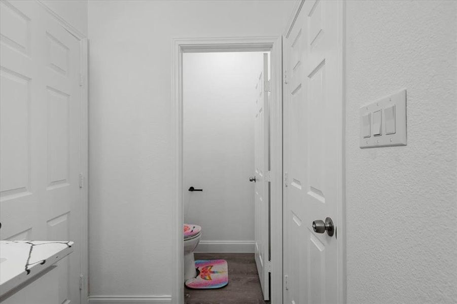 Bathroom with dark wood finished floors and vanity Bathroom with dark wood finished floors and vanity