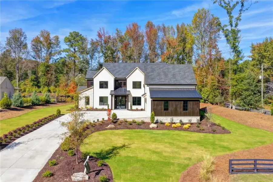 Front exterior of a new home in Lyndon Creek, Milton, GA, highlighting curb appeal (Image 38).
