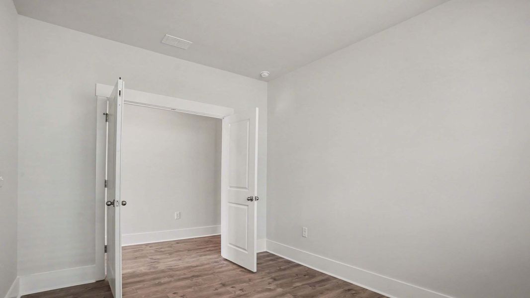 Representative unfurnished interior of a home built from the Danville by D.R. Horton in Chapman Village, Conway (Image 20).