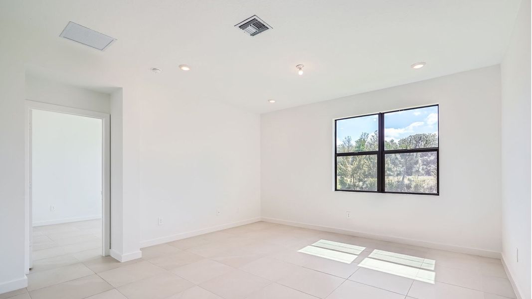 Representative unfurnished interior of a home built from the Cali by D.R. Horton in Twin Oaks, Stuart (Image 12).