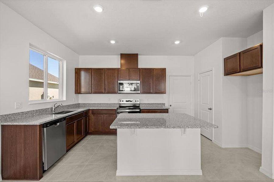Furnished interior view inside a new home in Robins Run, Lake Wales (Image 8). Furnished interior view inside a new home in Robins Run, Lake Wales (Image 8).