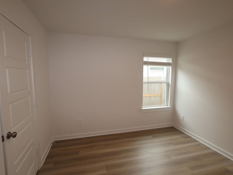 Spacious, unfurnished interior of a new home in Pinewood at Grand Texas, New Caney (Image 22).