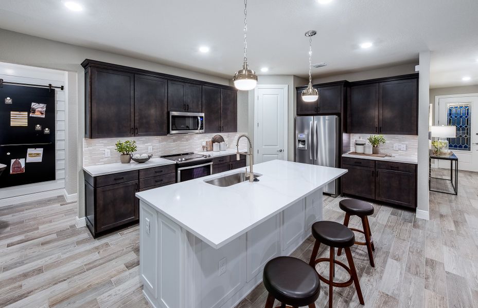 Representative furnished interior of a home built from the Fifth Avenue by DiVosta in Avondale at Avenir, Palm Beach Gardens (Image 14).
