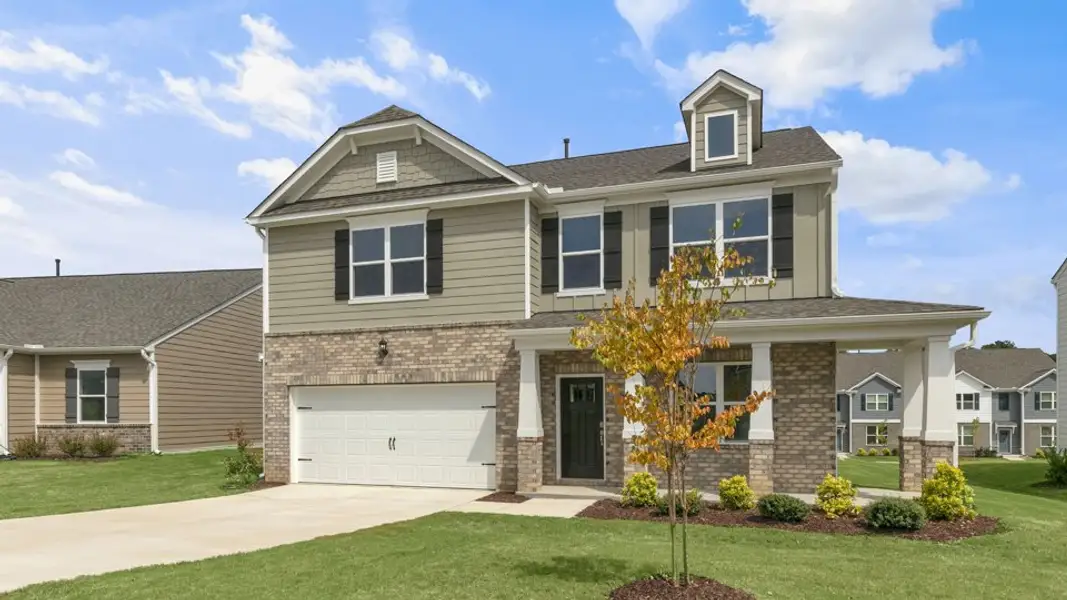 Front exterior of a new home in Anderson Farm, Wendell, NC, highlighting curb appeal (Image 2). Front exterior of a new home in Anderson Farm, Wendell, NC, highlighting curb appeal (Image 2).