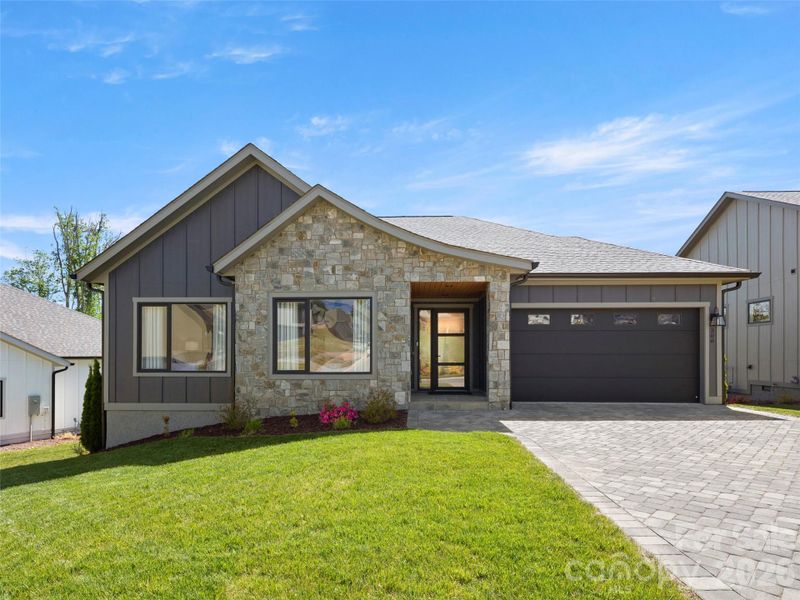 Front exterior of a new home in , Arden, NC, highlighting curb appeal (Image 1). Front exterior of a new home in , Arden, NC, highlighting curb appeal (Image 1).
