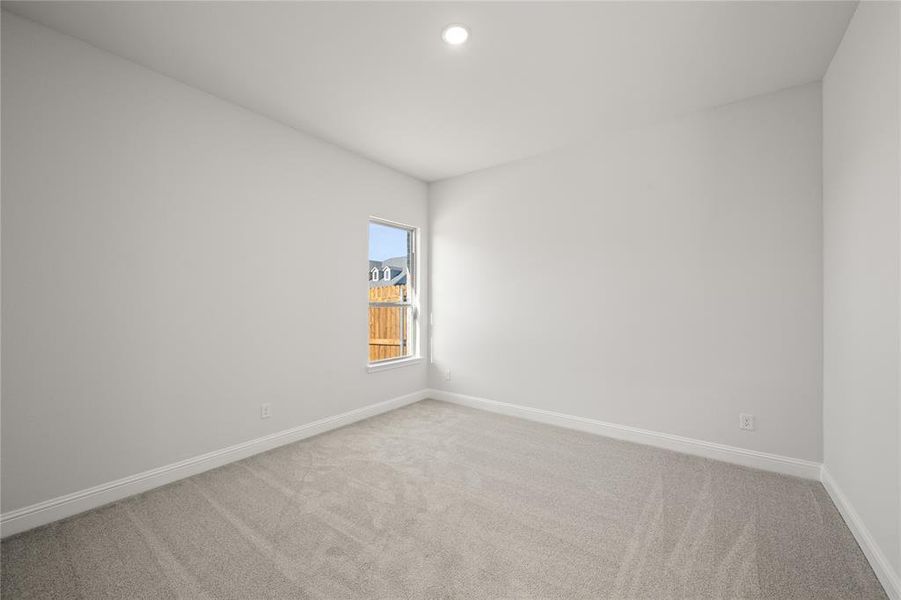 Empty room featuring carpet floors