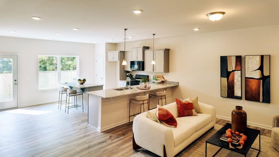 Furnished interior view inside a new home in Sterling At The Villages, Calhoun (Image 12).