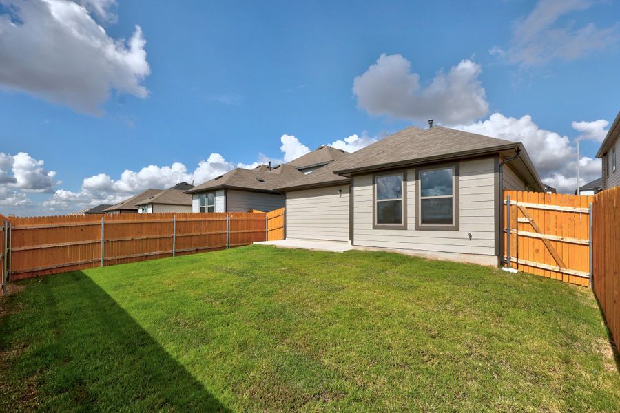 Exterior details and patio area of a home in Trinity Ranch, Elgin (Image 22).