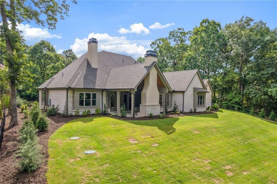 Front exterior of a new home in , Flowery Branch, GA, highlighting curb appeal (Image 30).