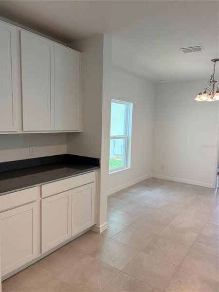 Spacious, unfurnished interior of a new home in Preservation Pointe, Davenport (Image 19).