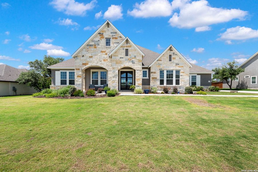 Front exterior of a new home in , Castroville, TX, highlighting curb appeal (Image 20). Front exterior of a new home in , Castroville, TX, highlighting curb appeal (Image 20).